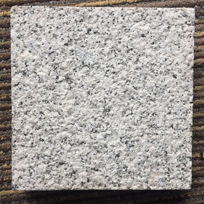 芝麻白花崗巖燒面與荔枝面干掛工藝詳解